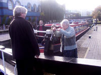 Giles Higgitt instructing how to operate a paddle on a lock